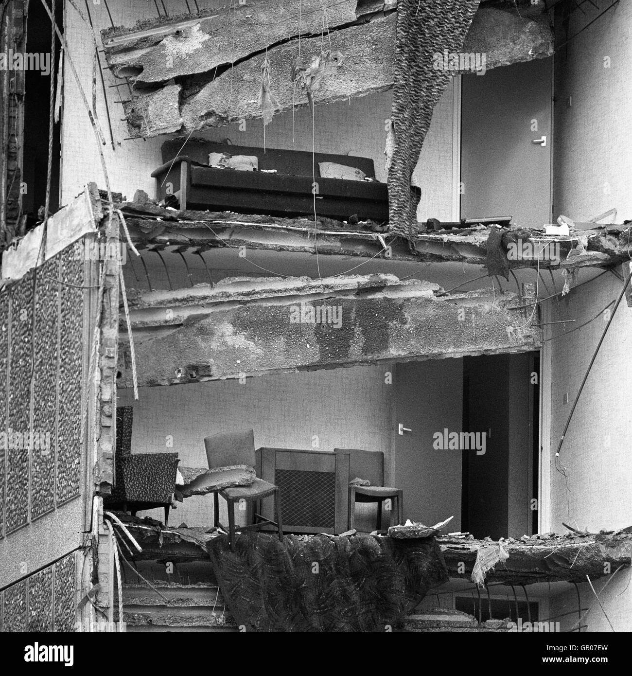 The remains of furniture on two floors after the collapse of a complete corner of a 22 storey block of flats at Canning Town in the east End of London. Stock Photo