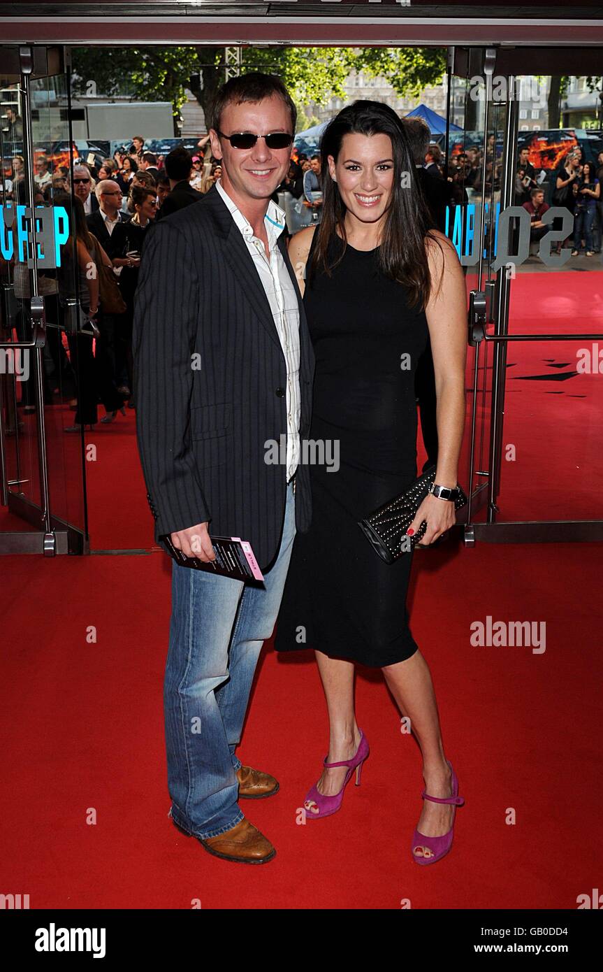 John Simm and his wife Kate Magowan arrive for the European premiere of 'The Dark Knight' at the Odeon West End Cinema, Leicester Square, London. Stock Photo