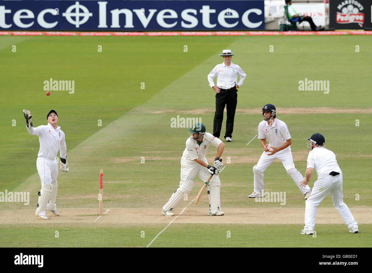 Cricket - npower First Test - Day Four - England v South Africa - Lord's. England's wicketkeeper Tim AMbrose (l) attempts to catch a ball while South Africa's Neil McKenzie bats Stock Photo