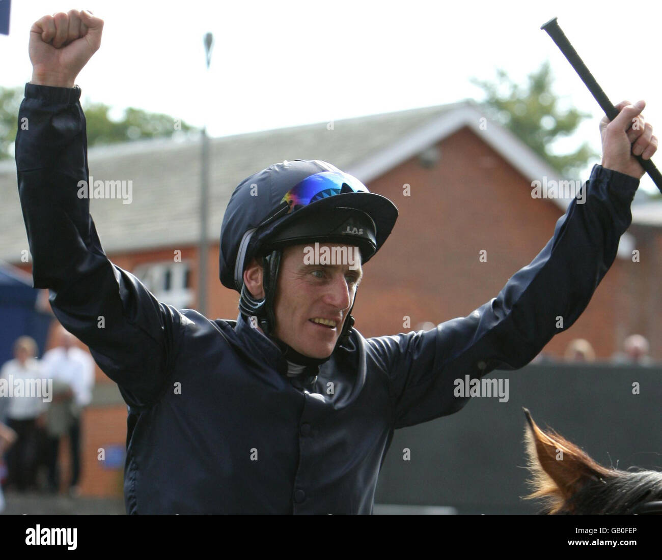 Jockey Johnny Murtagh celebrates after winning The King VI and