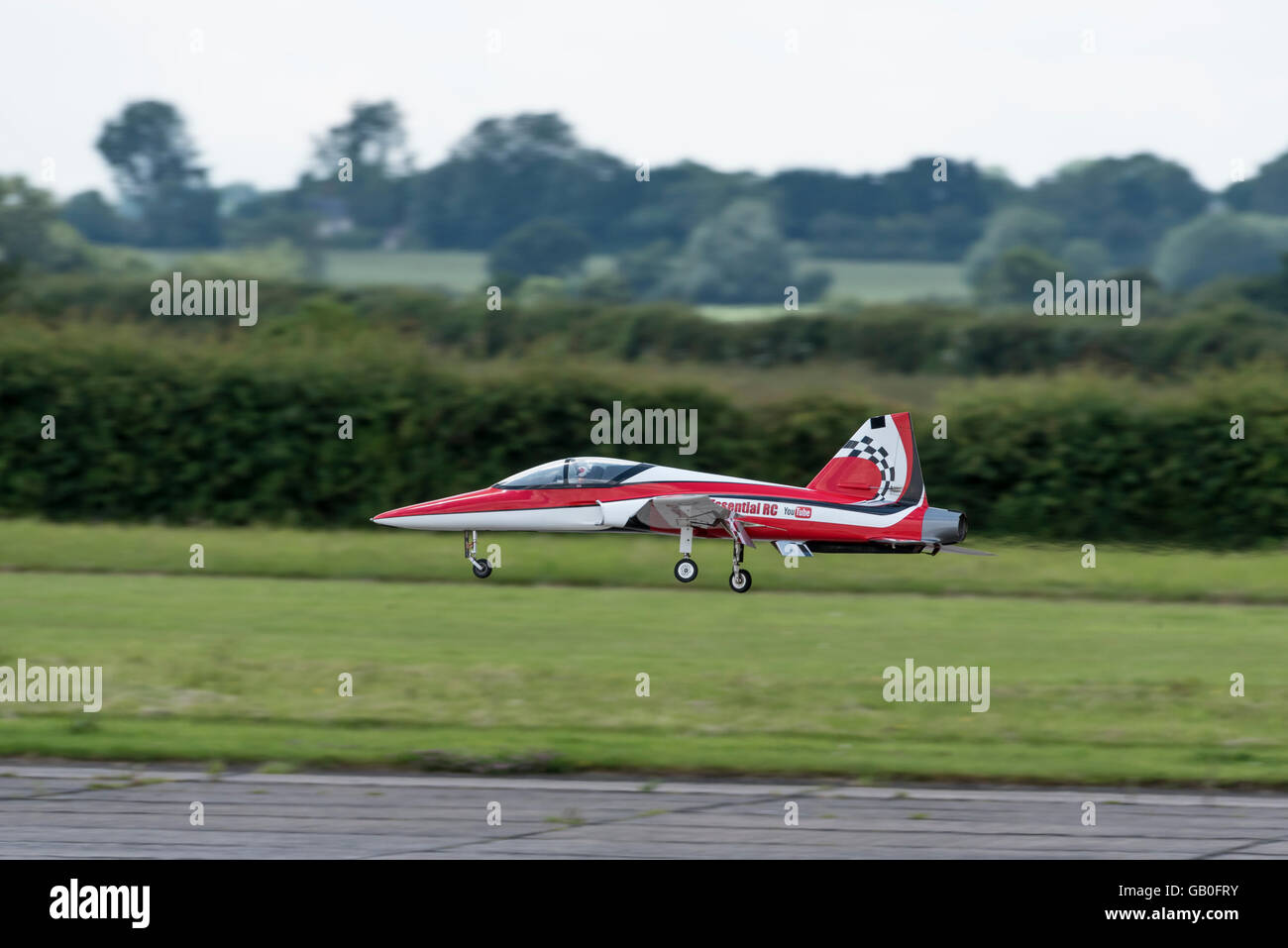 Model jet safely airborne at Wings 'n' Wheels North Weald airfield Epping Essex England Stock Photo