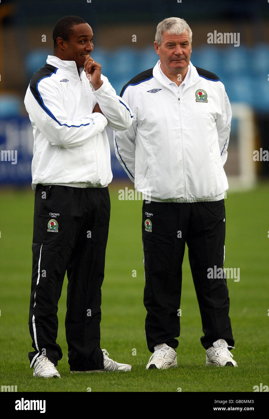 Blackburn Rovers manager Paul Ince and his assistant Archie Knox before the kick off of the Pre-Season Friendly match at the Moss Rose Stadium, Macclesfield. Stock Photo
