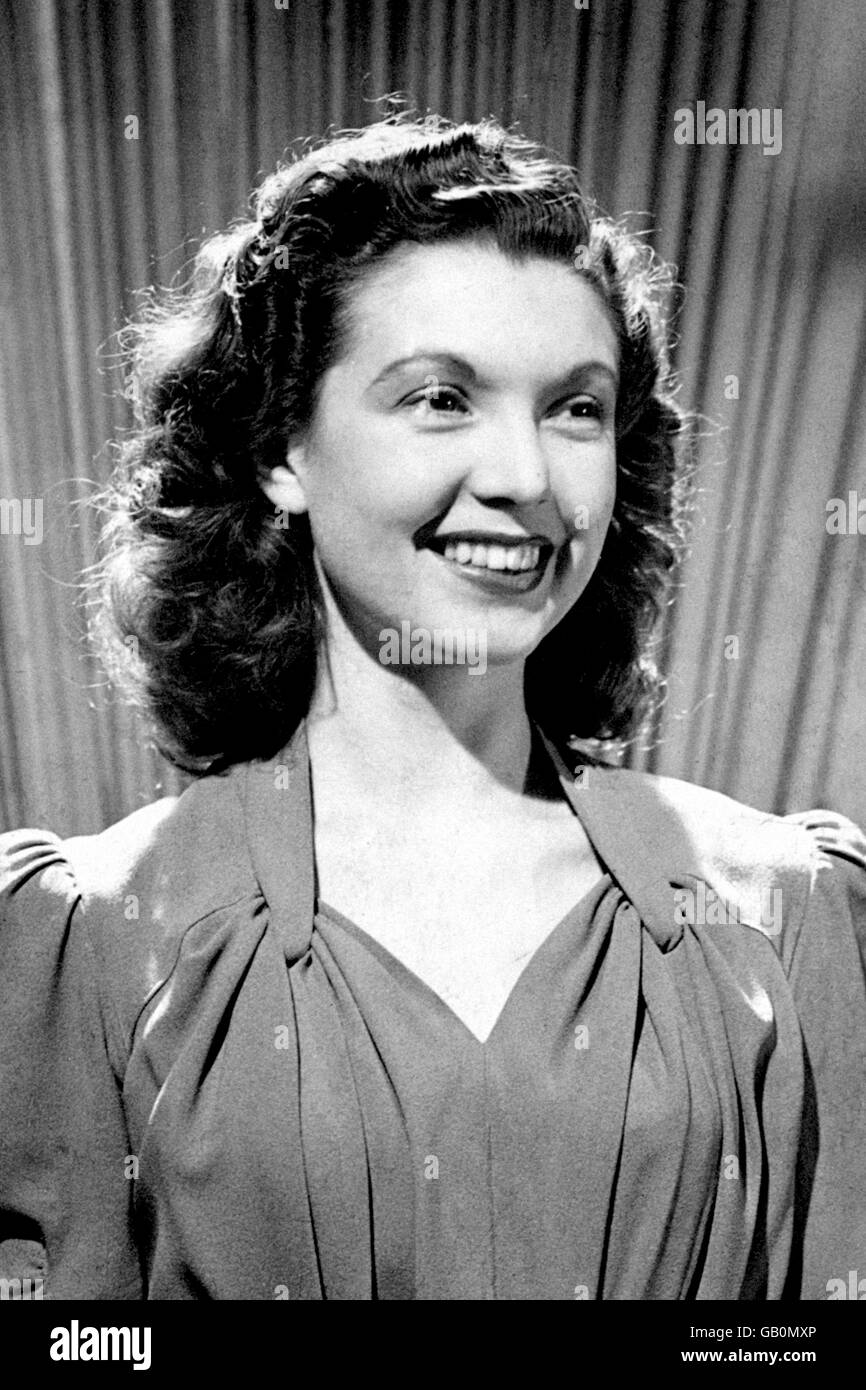 Announcer Sylvia Peters wearing her hair in soft curls popular in the forties. Stock Photo