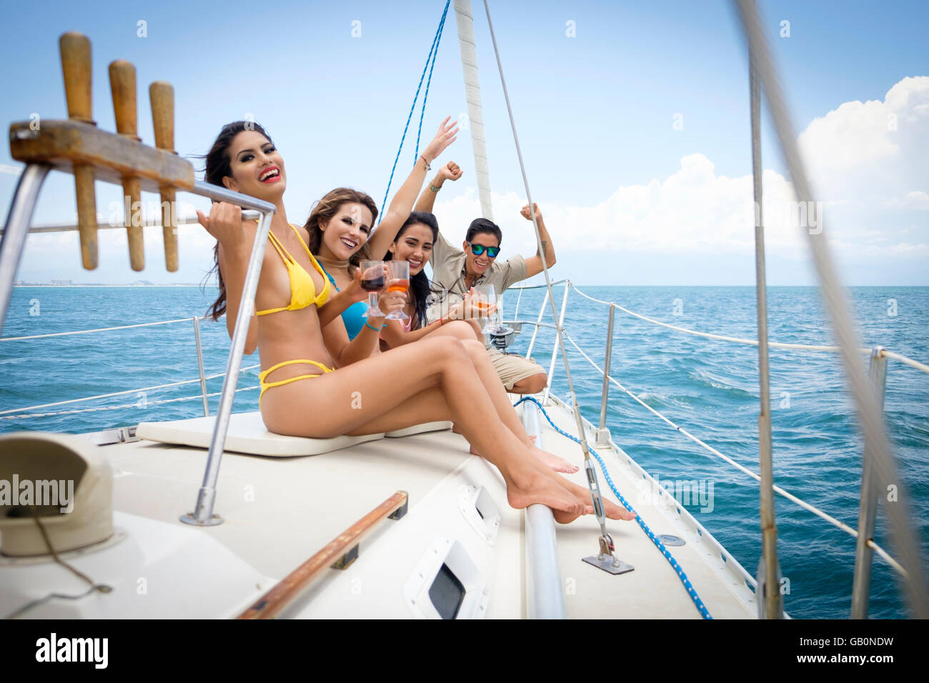 Group of young people enjoying a sailboat tour, Riviera Nayarit, Mexico Stock Photo