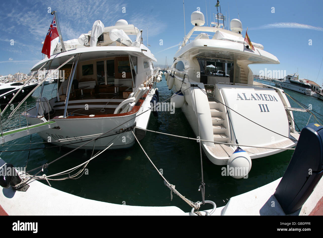 Yachts at Puerto Banus at night with nightlife and parties on boats,  Marbella, Andalusia, Spain Stock Photo - Alamy