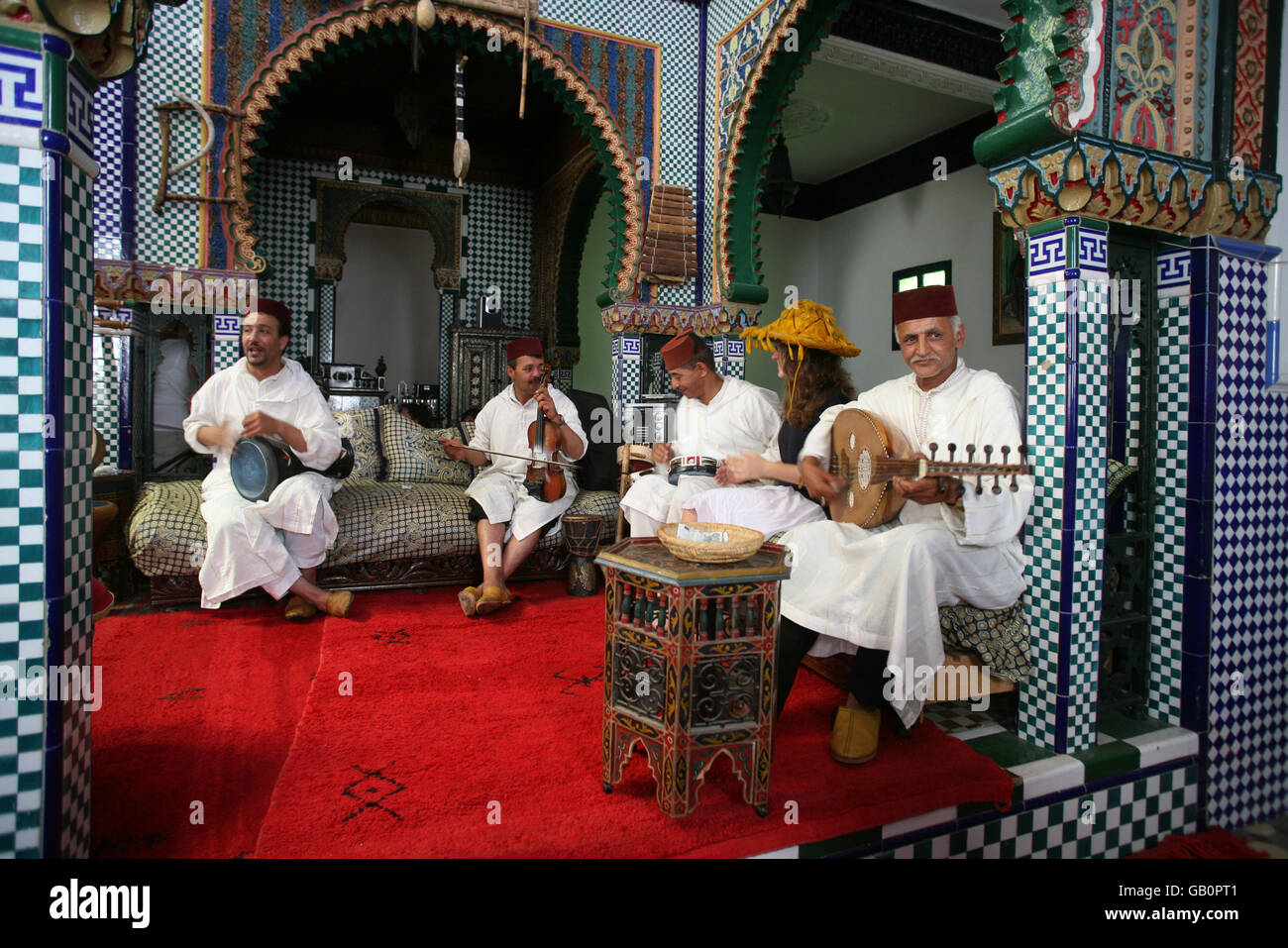 Local musicians entertain diners in a restaurant in tangier hires