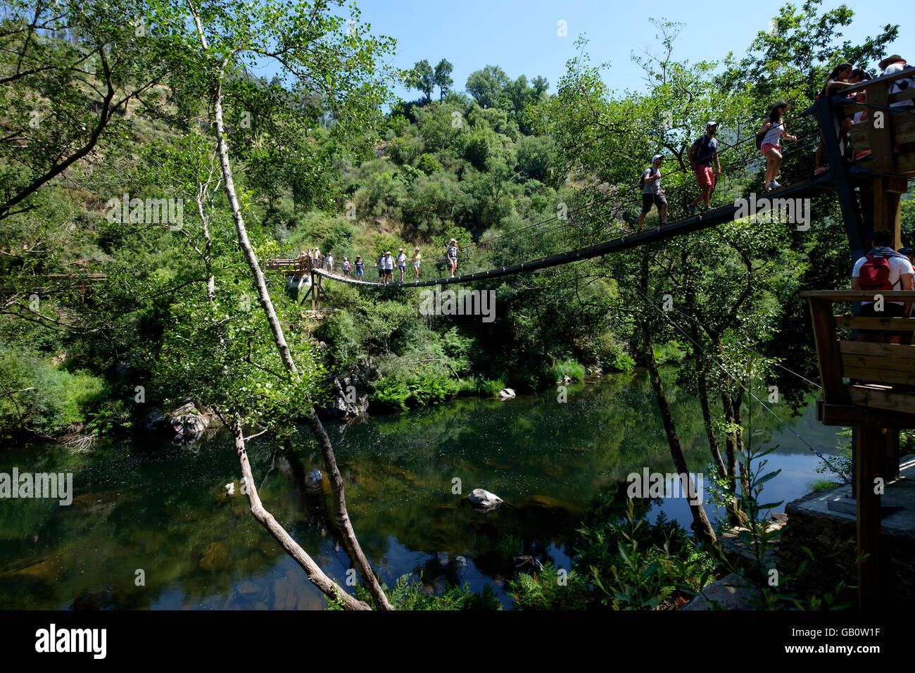 People traversing suspension bridge at the Paiva walkways in Arouca, Portugal, Europe Stock Photo