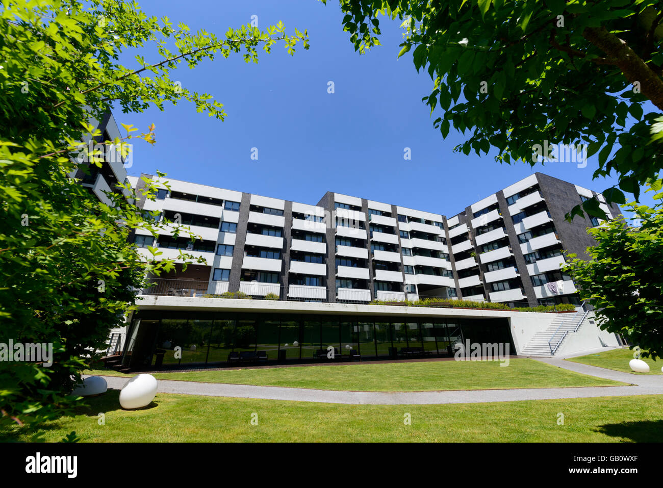 Garden inside a modern architecture residential apartment building gated community Stock Photo