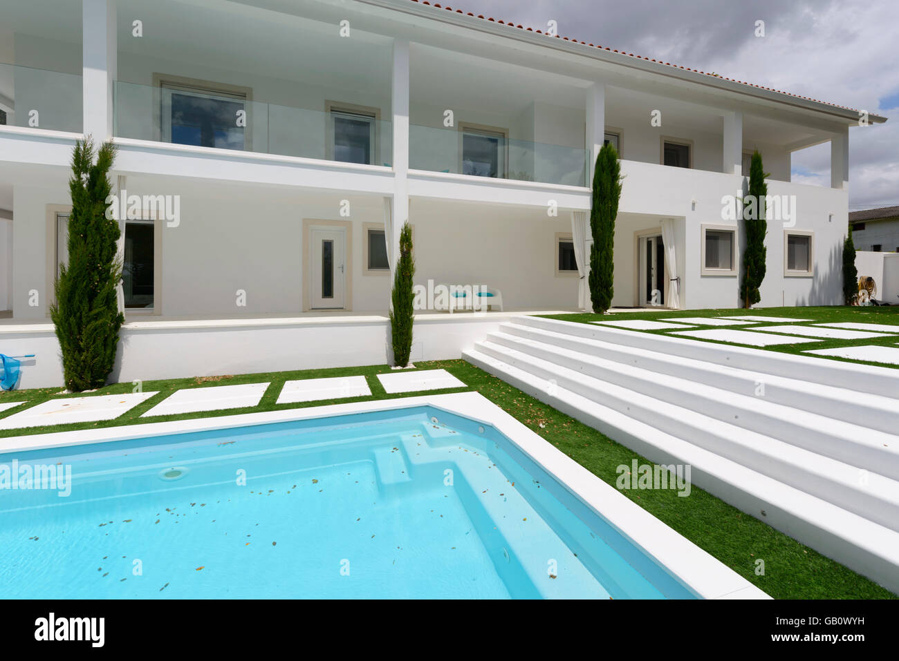 House with outdoor swimming pool Stock Photo