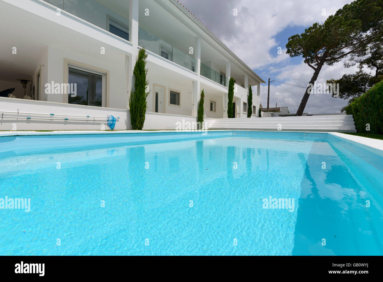 House with outdoor swimming pool Stock Photo