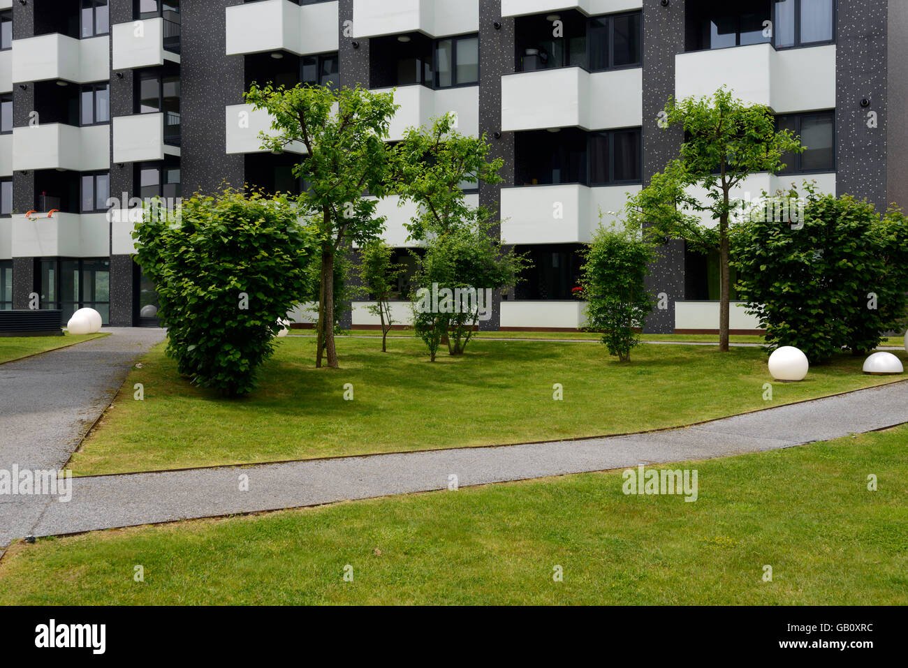 Garden inside a modern architecture residential apartment building ... - Rustic Garden Apartment Building Designs