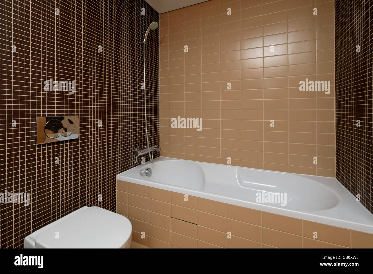 Modern bathroom with brown tiles Stock Photo Alamy