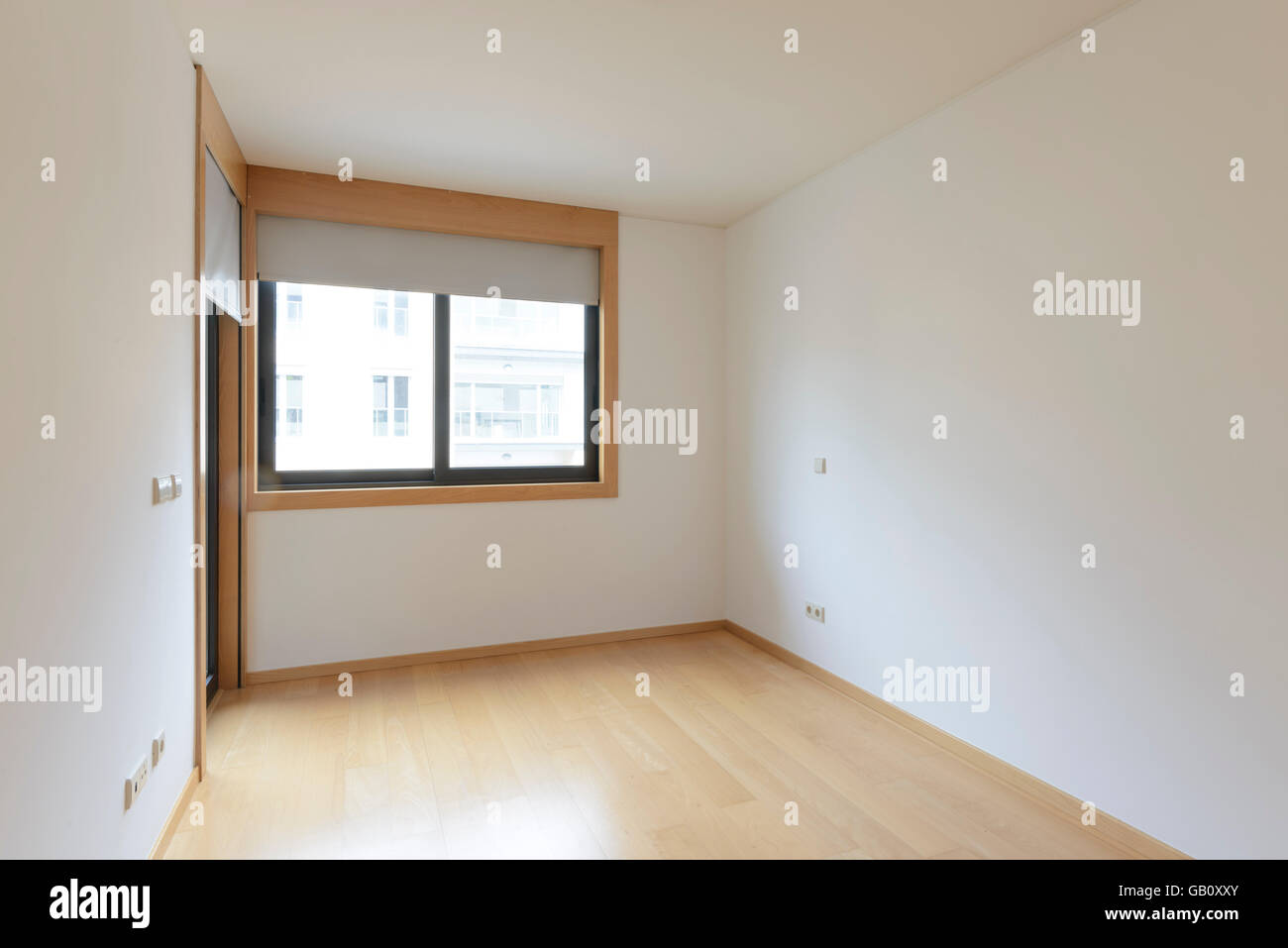 Empty room with big window Stock Photo - Alamy