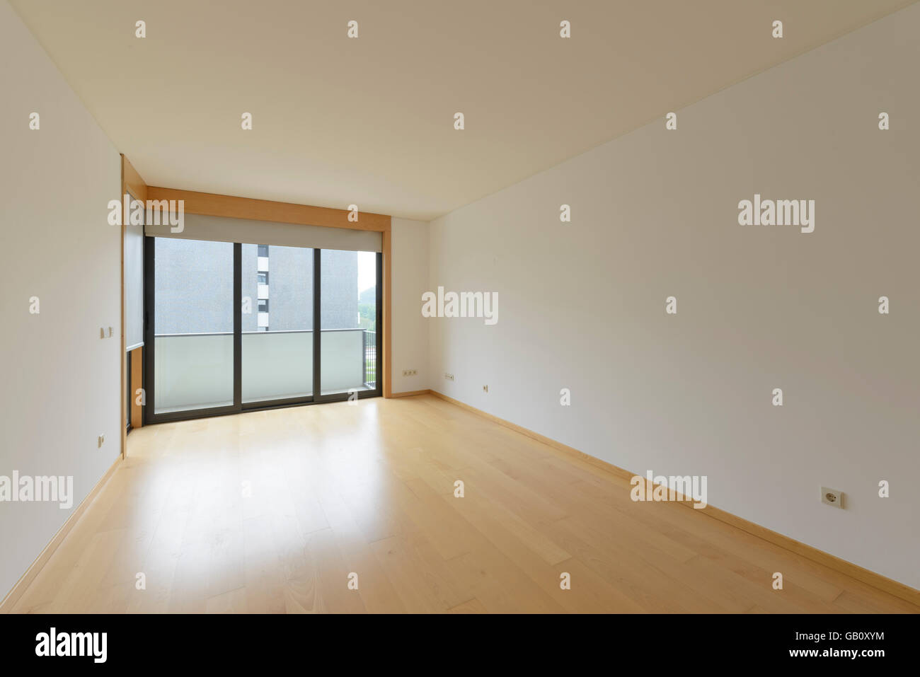 Empty room with big window Stock Photo - Alamy