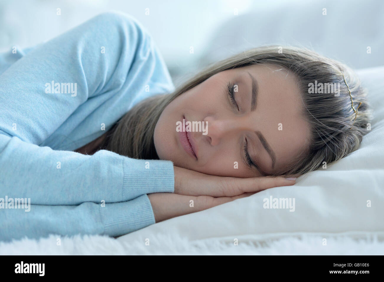 beautiful woman sleeping in bed Stock Photo Alamy