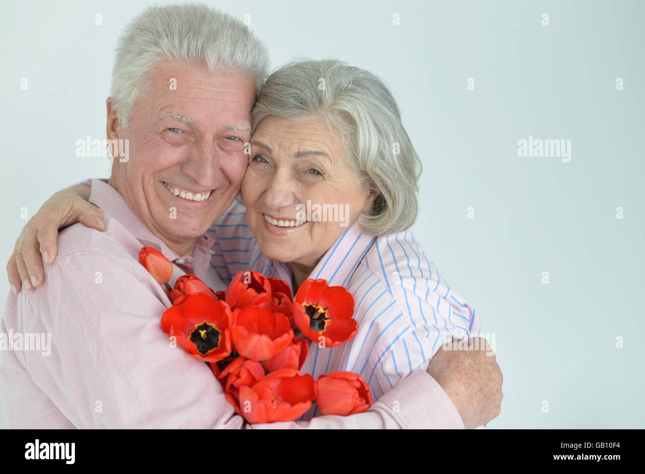 Mature couple with poppies Stock Photo