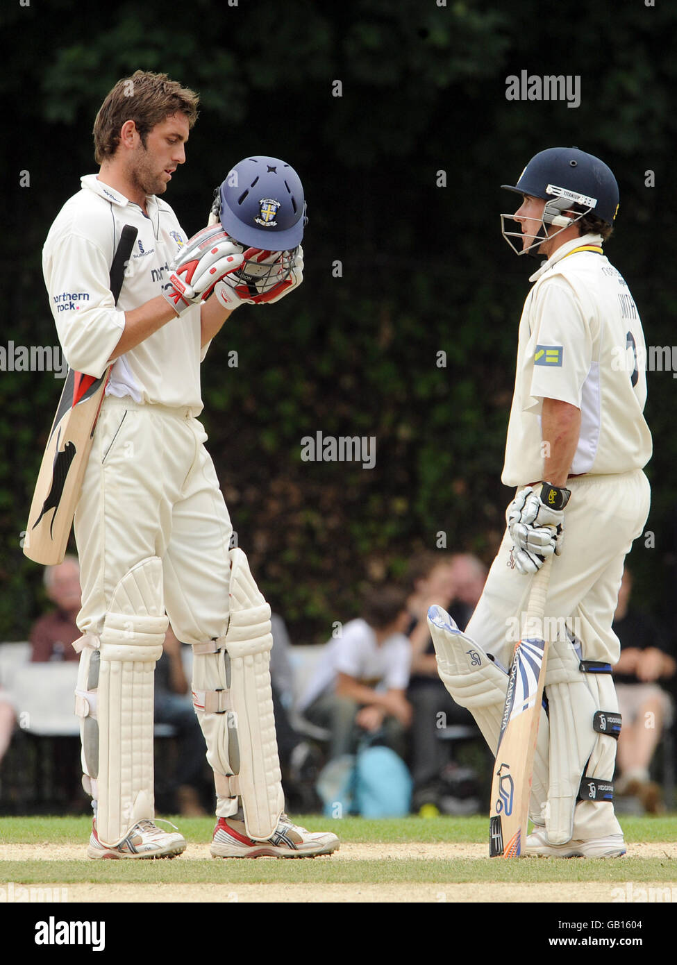 Cricket - Liverpool Victoria County Championship - Division One - Day Three - Surrey v Durham - Guildford Cricket Centre. Durham's Liam Plunkett (l) chats with team mate Will Smith Stock Photo