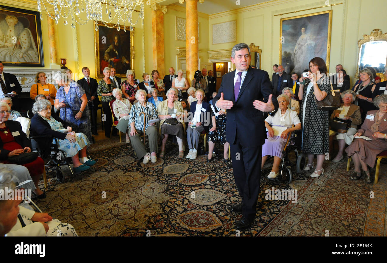 Prime Minister Gordon Brown at a ceremony at 10 Downing Street in London, acknowledging the contribution to the WWII effort of around fifty surviving members of the Women's Land Army (WLA) and the Women's Timber Corps (WTC) who received commemorative badges from Environment Secretary Hilary Benn. Stock Photo