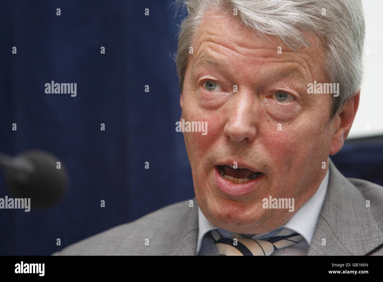 Health Secretary Alan Johnson answers questions after having delivered a lecture to the Fabian Society on public health at Westminster Central Hall in central London. Stock Photo