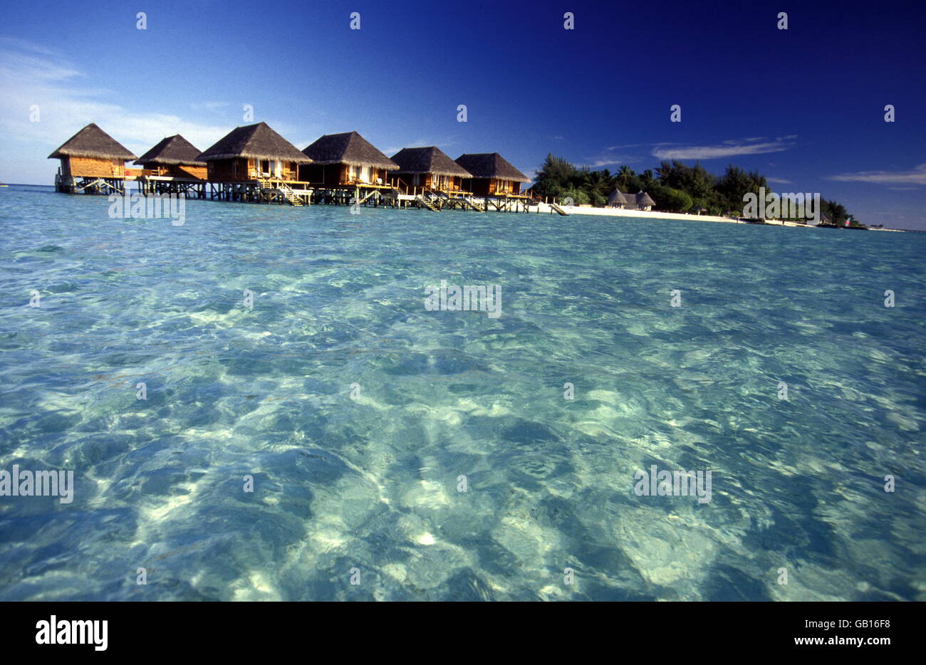 bungalow at the seascape of the island and atoll of the Maldives Islands in the indian ocean. Stock Photo