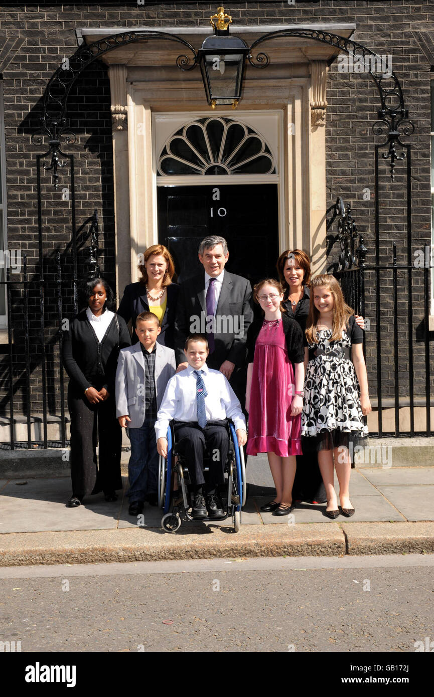 Prime Minister Gordon Brown, Sarah Brown and Natasha Kaplinsky meet the five finalists of 'Britain's Kindest Kids' (From left to right) Tara Ifill, 14 from Bermondsey in London, Charlie Doherty, 8 from Crawley in West Sussex, Liam Fairhurst, 12 from Bury St Edmunds, Kirsty Turnbull, 15 from Aviemore in Scotland, Daniella Jacobson, 12 from Elstree in London pictured during a photocall at 10 Downing Street, central London. Stock Photo