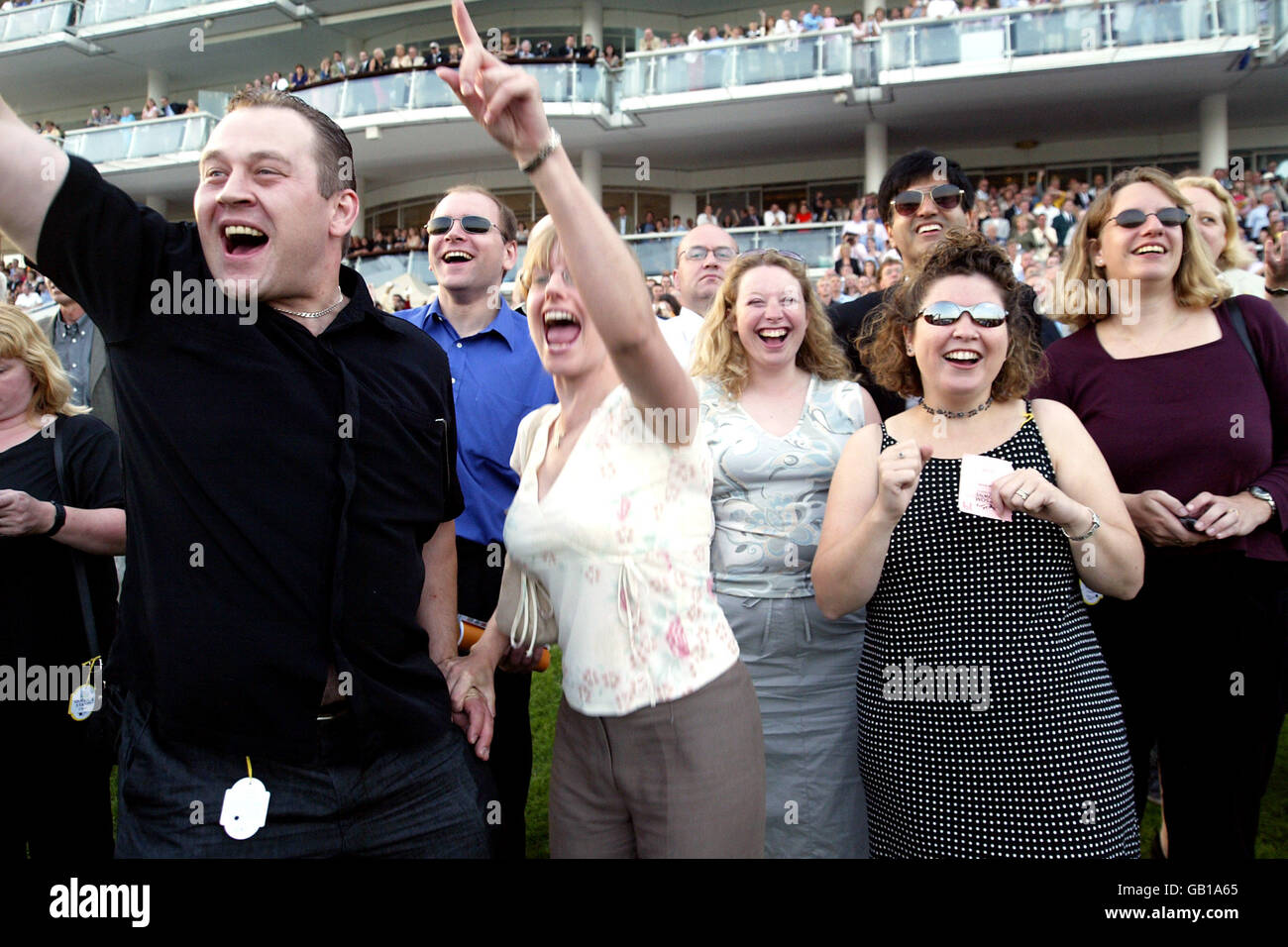 Horse Racing, Epsom Races. Punters cheer on their horses Stock Photo
