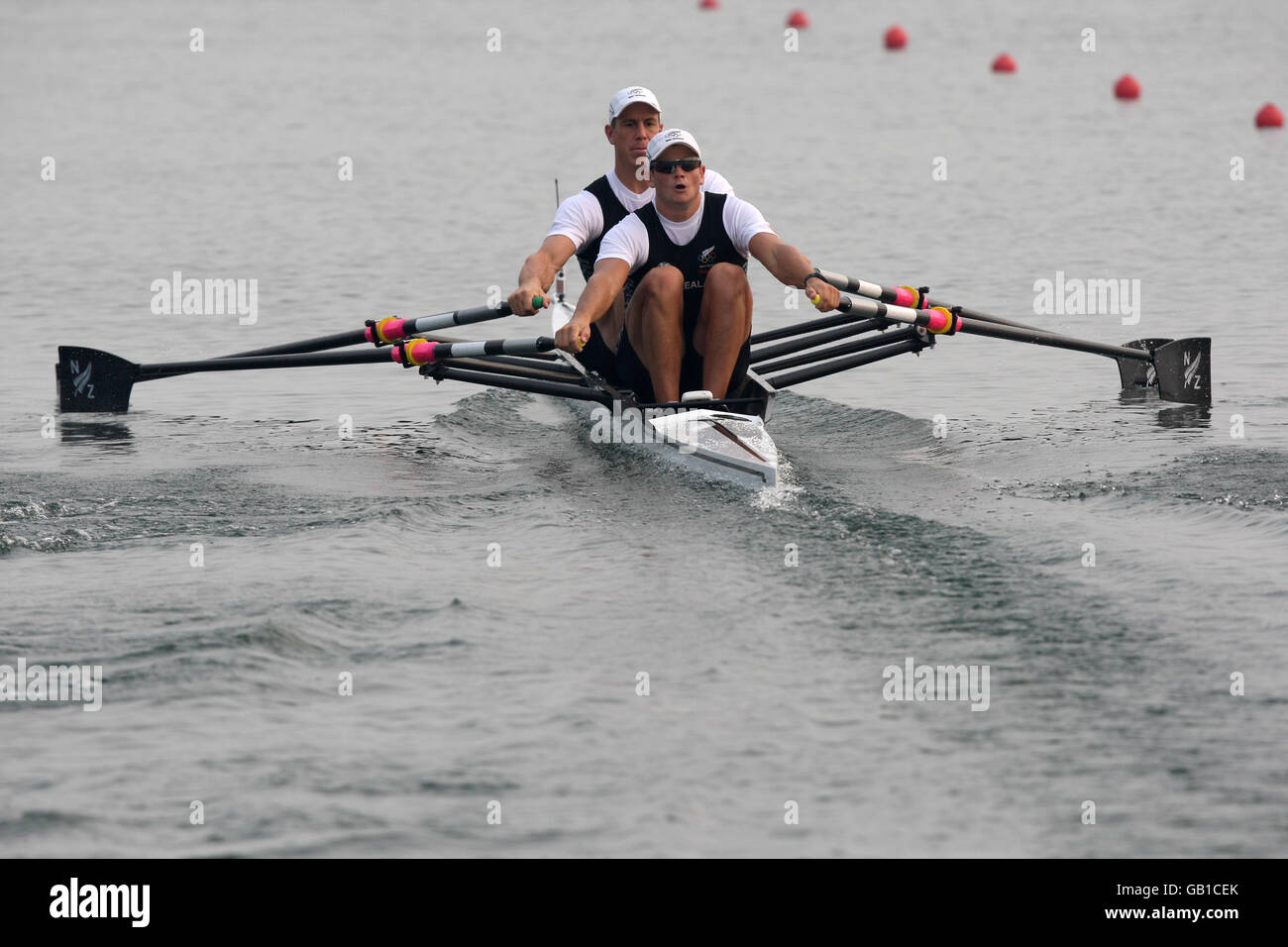 Olympics - Beijing Olympic Games 2008 - Day One. New Zealand's Rob Waddell and Nathan Cohen during the men's double sculls qualification race Stock Photo
