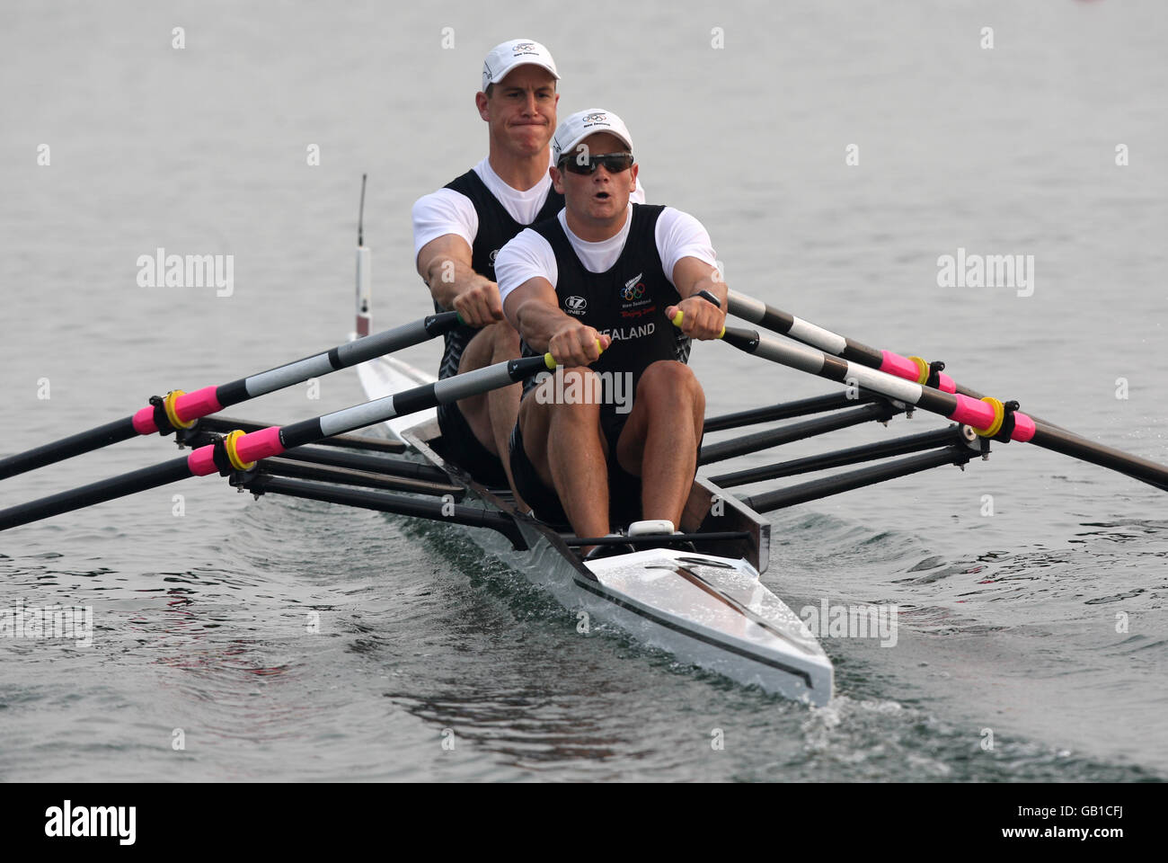 New Zealand's Rob Waddell and Nathan Cohen during the men's double sculls qualification race Stock Photo