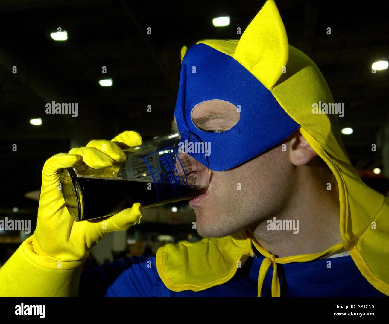 Bananaman, aka Rob Barford from Essex, enjoys the Great British Beer Festival in Earls Court, London. Stock Photo