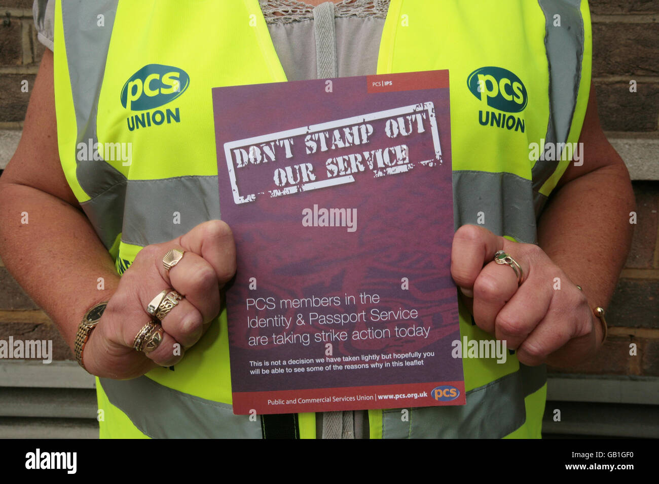 A member of staff from the passport office outside the London Victoria