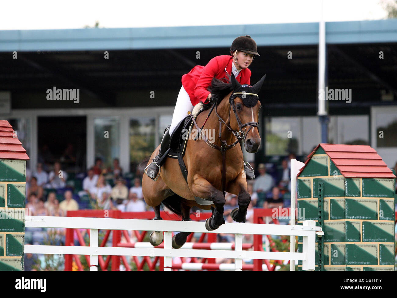 Great Britain's Ellen Whitaker rides Henri De Herne in the Sky Sports Speed Stakes during the Hickstead International Horse Show at the All England Jumping Course, Hickstead. Stock Photo