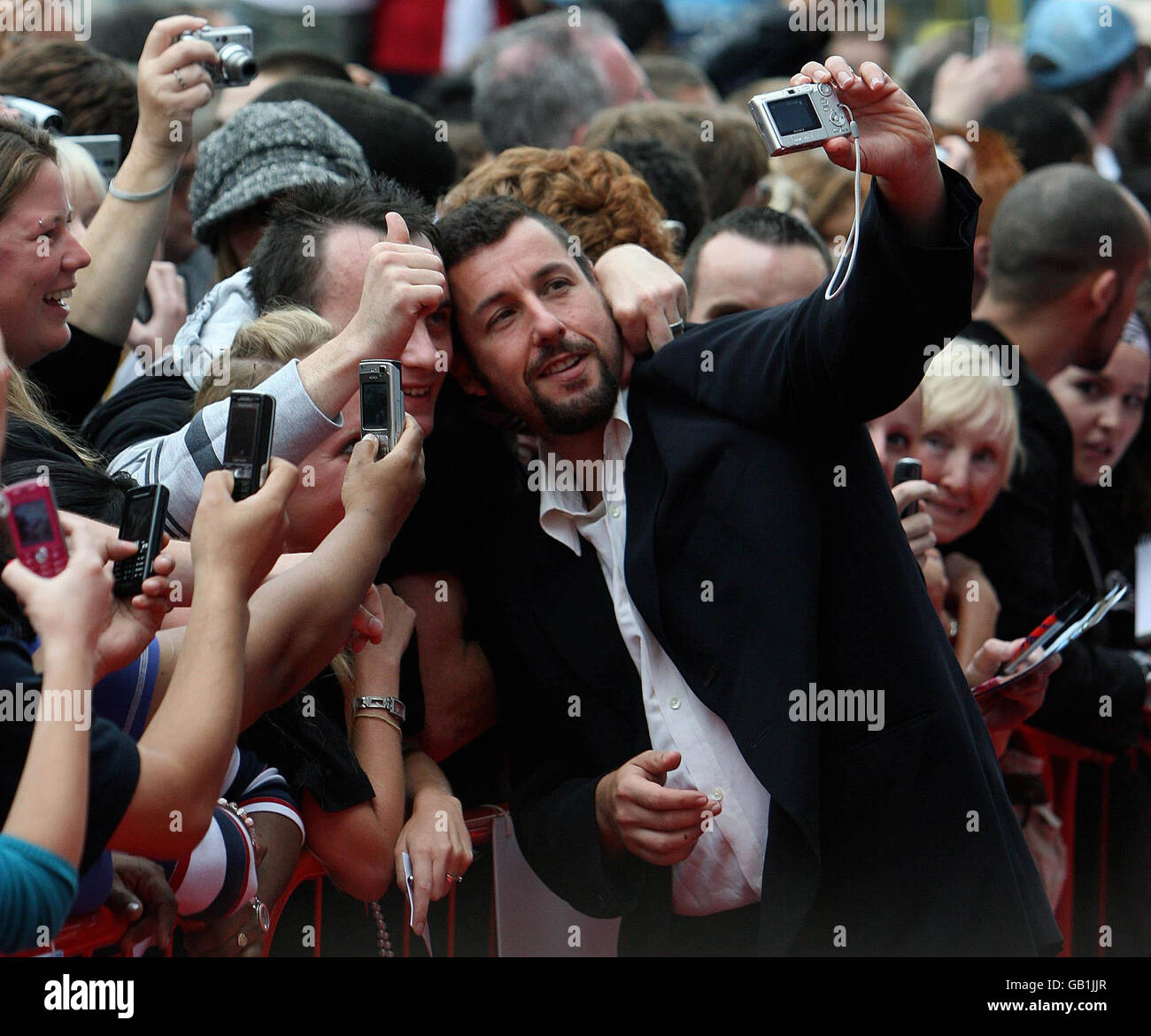Adam Sandler poses with fans on the red carpet at the Irish Premiere of 'You Don't Mess With The at the Savoy Cinema Dublin Stock Photo -