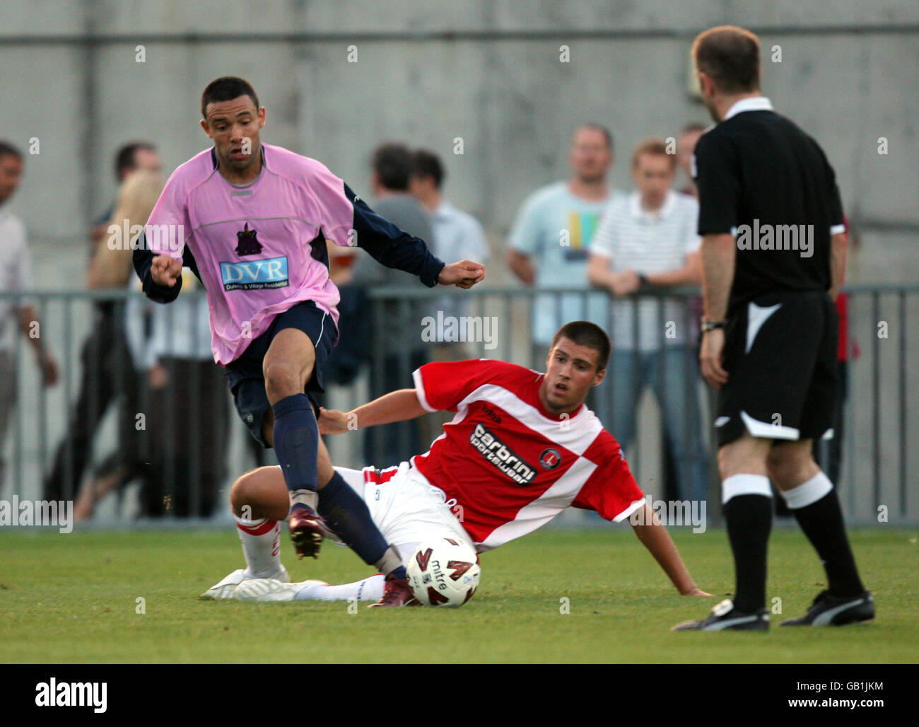 Soccer - Friendly - Dulwich Hamlet v Charlton Athletic - Champion Hill Stadium. Dulwich Hamlet's Scott Simpson and Charlton Athletic's Grant Basey Stock Photo