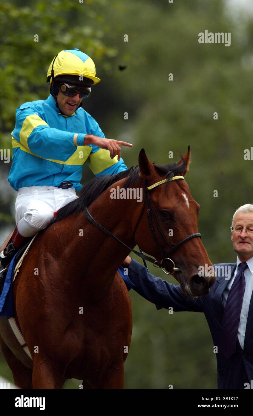 Darryl Holland celebrates riding Falbrav to victory in The Coral-Eclipse Stakes Stock Photo