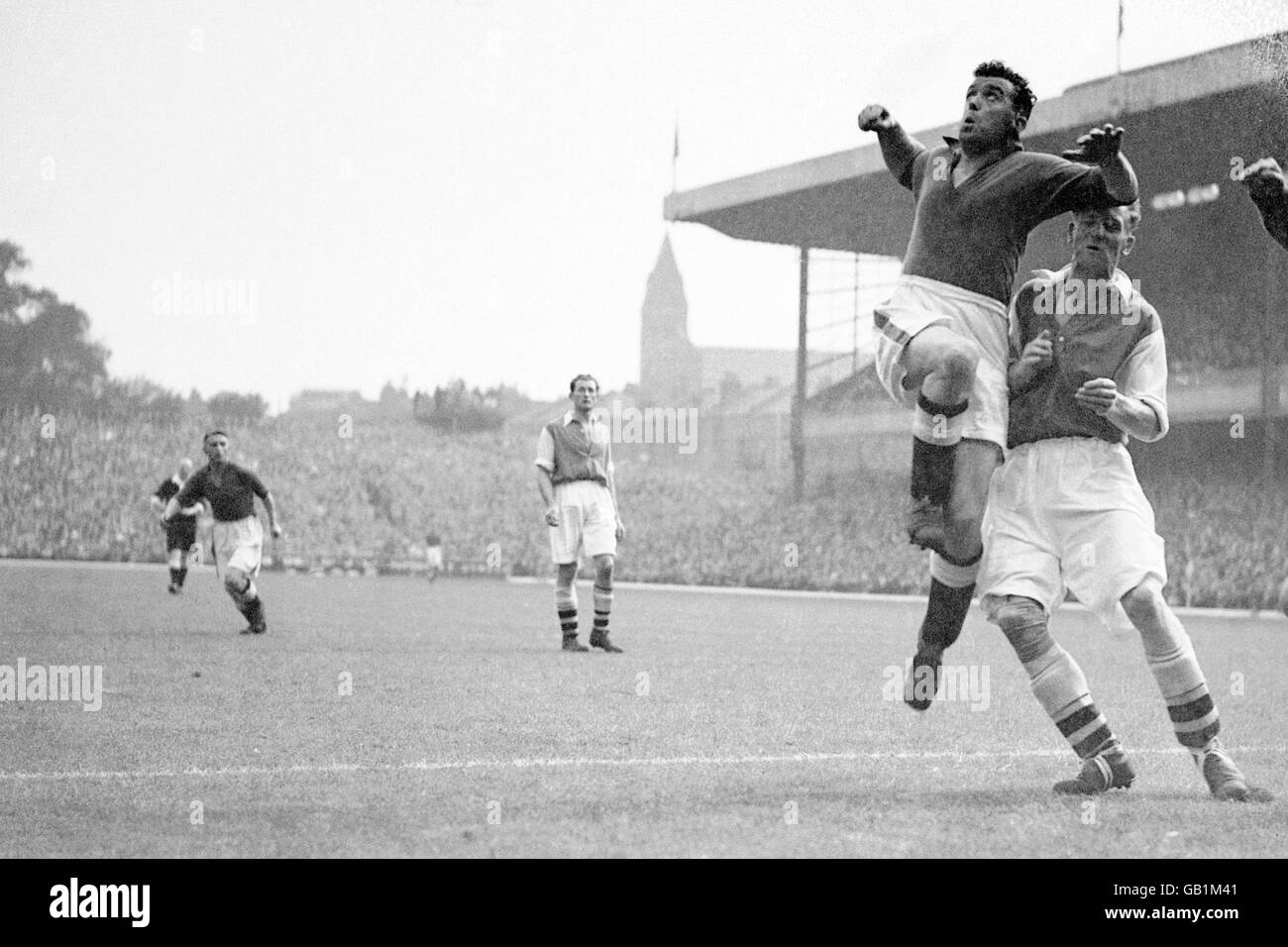 Everton's Dixie Dean (second r) climbs high as the ball is crossed into the box Stock Photo