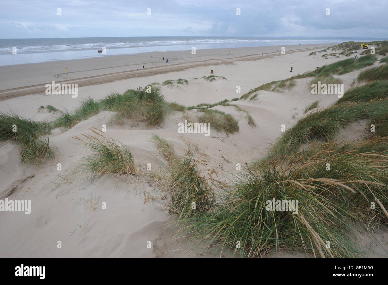 A general view of the beach at Cefn Sidan, near Burry Port, west Wales, where a 16-year-old boy died after a tunnel dug in sand dunes collapsed last night. Stock Photo