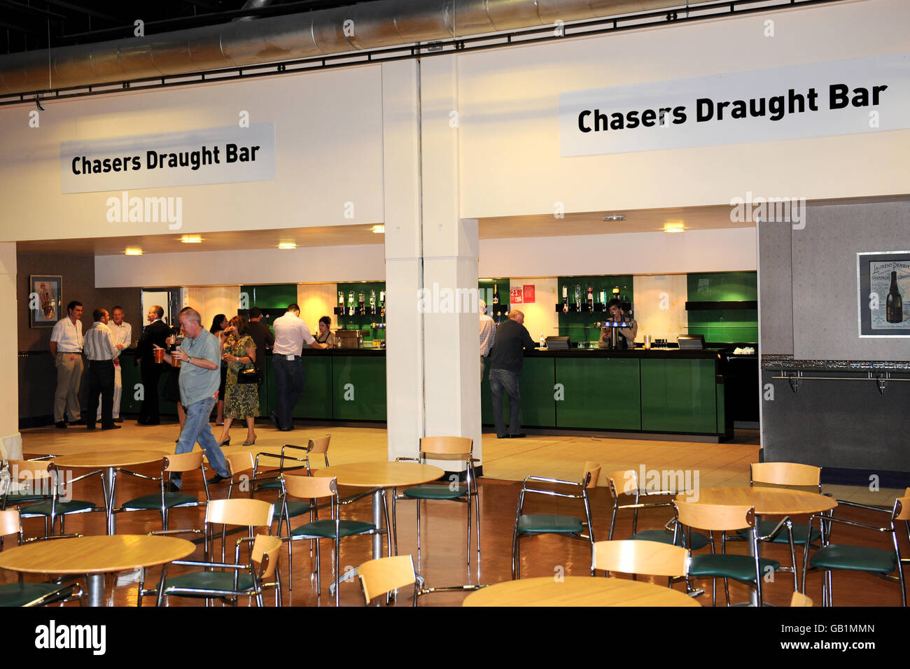 Horse Racing - Big Night Down Under - Sandown Park Racecourse. The Chasers Draught Bar Stock Photo