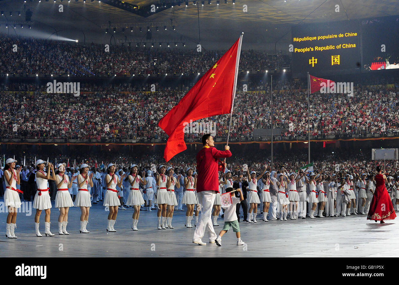 People's Republic of China Flag Carrier and Basketball player Yao Ming with his son during the Beijing Olympic Games 2008 Opening Ceremony at the National Stadium in Beijing, China. Stock Photo