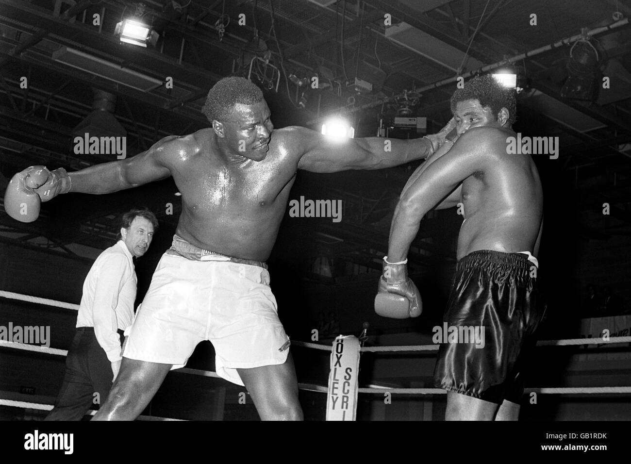 Action during a bout between Greg Page and Funso Banjo. Stock Photo