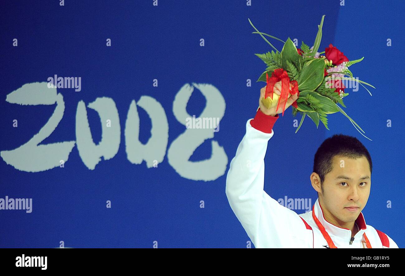 Japan's Kosuke Kitajima celebrates with his Gold Medal for winning the ...