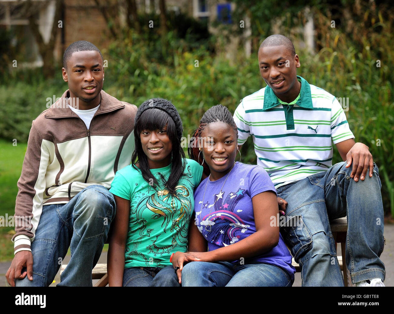 (Left to right) 18-year-old quadruplets Tobi, Tayo, Tolu, and Tosin, who are all members of the Oke family, just a couple of minutes apart by birth, and achieved A and B grades at the St Francis Xavier Sixth Form College in Clapham, south-west London. Stock Photo