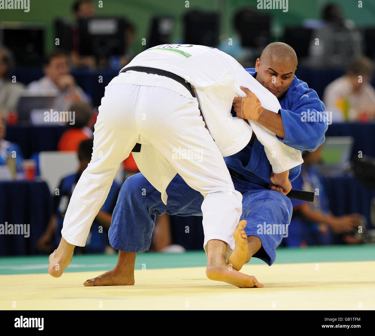 Great Britain's Peter Cousins in action against Georgia's Levan Zhorzholiani in the Men's -100kg class at Beijing's University of science and technology Gymnasium Stock Photo