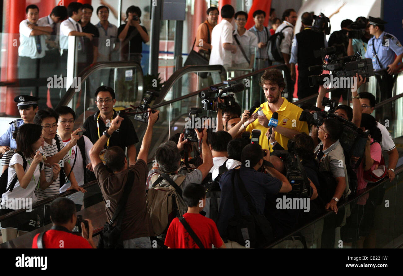 Spanish N.B.A. Basketball Player Mark Gasol is mobbed by the media as he arrives at Beijing airport as preparations continue for the start of the Beijing Olympics . Stock Photo