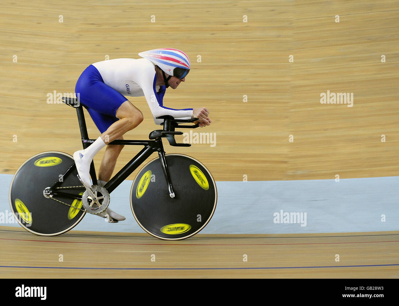 Great Britain's Bradley Wiggins during his heat in the Men's Individual Pursuit at the Laoshan Velodrome during the 2008 Beijing Olympic Games in China. Stock Photo