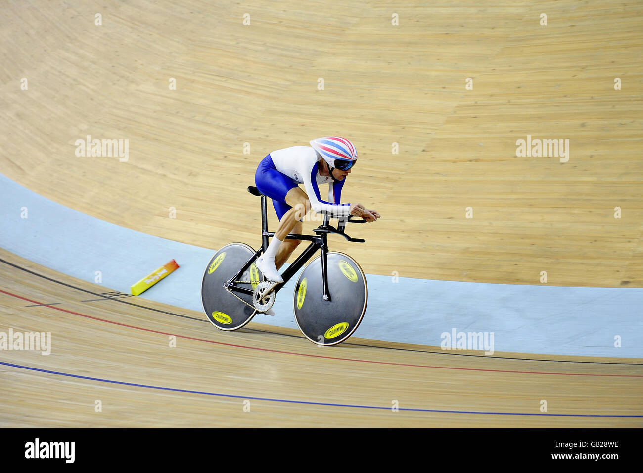 Great Britain's Bradley Wiggins during his heat in the Men's Individual Pursuit at the Laoshan Velodrome during the 2008 Beijing Olympic Games in China. Stock Photo