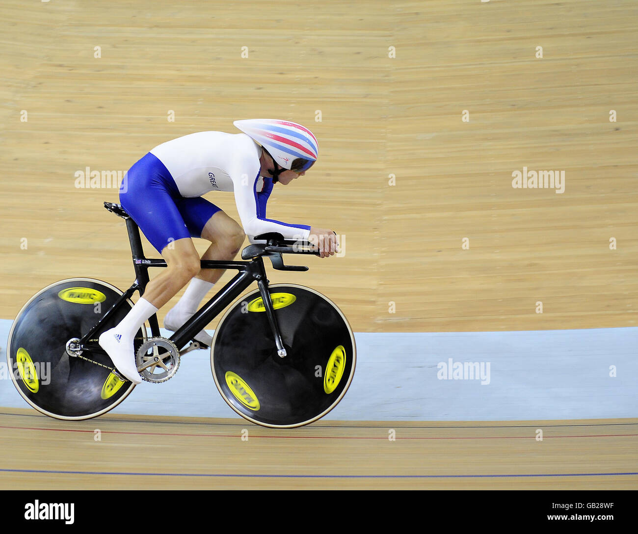 Great Britain's Steve Burke during his heat in the Men's Individual Pursuit at the Laoshan Velodrome during the 2008 Beijing Olympic Games in China. Stock Photo