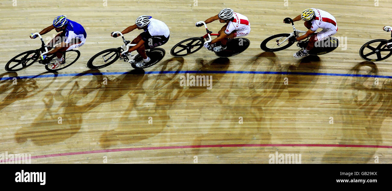 Cyclists warm-up ahead of a competition at the Laoshan Velodrome during the 2008 Beijing Olympic Games in China. Stock Photo