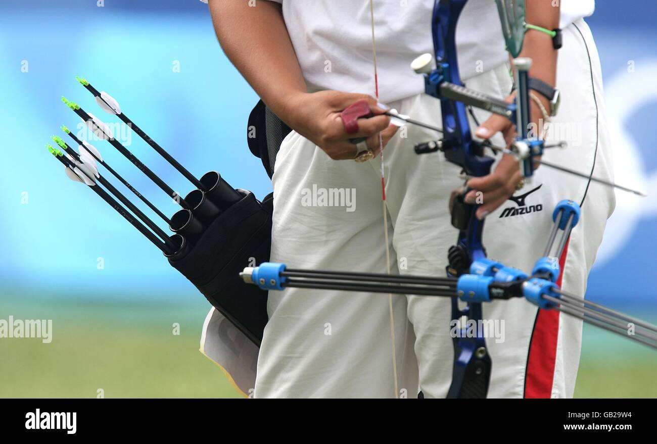 Georgia's Khatuna Narimanidze knocks her arrow on to her bow string during her Women's Individual 1/8 Eliminations match at the Olympic Green Archery Field on day 6 of the 2008 Olympic Games in Beijing. Stock Photo