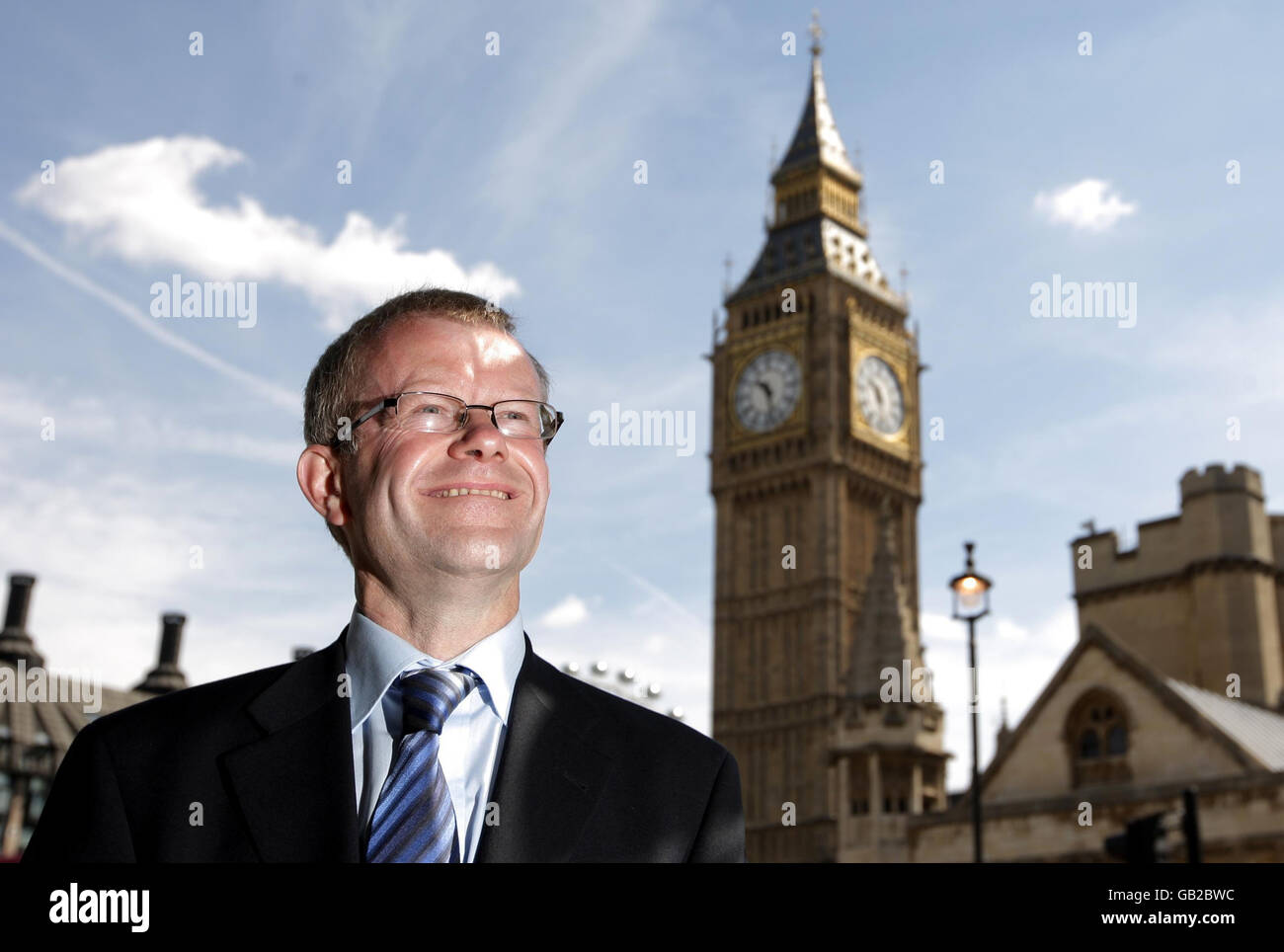 John Mason, the new Scottish National Party MP for Glasgow East, stands outside the Houses of Parliament, Westminster, London. Stock Photo