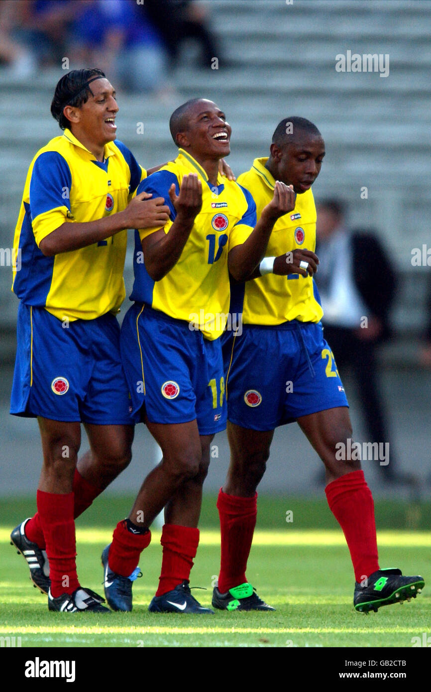 Soccer - FIFA Confederations Cup 2003 - Group A - Colombia v New Zealand. Colombia's Jorge Lopez (c) celebrates scoring against New Zealand with teammates Jairo Patino (l) and Gonzalo Martinez (r) Stock Photo